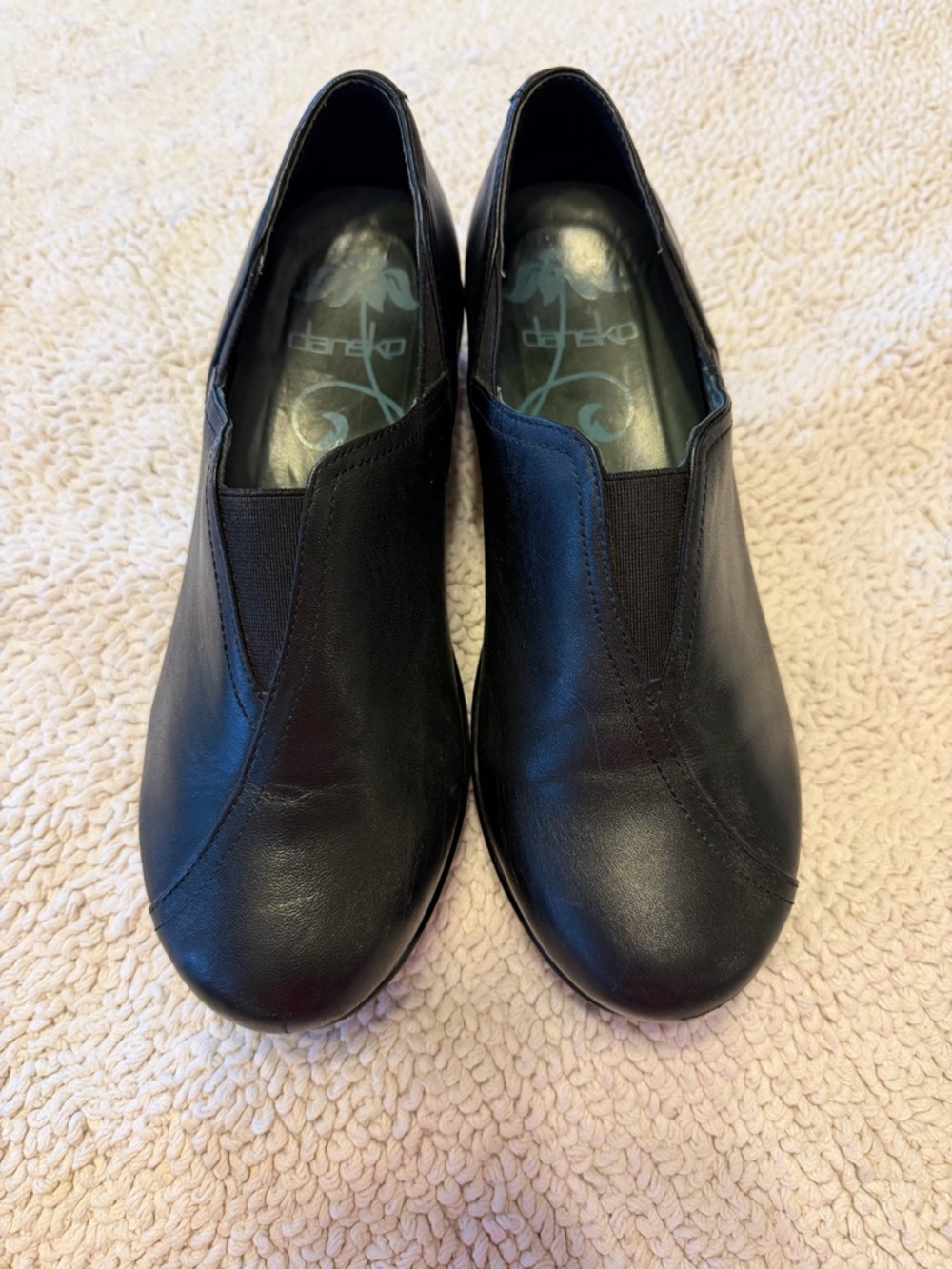 Dansko Black Slip-On Leather Flats